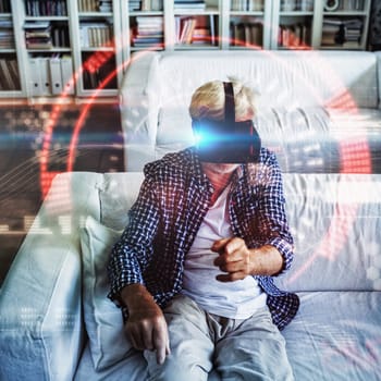Composite image of face against senior man wearing virtual reality headset in living room