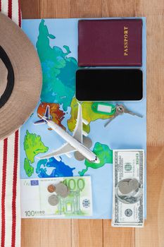 Top-view of holiday and tourism conceptual image with travel accessories