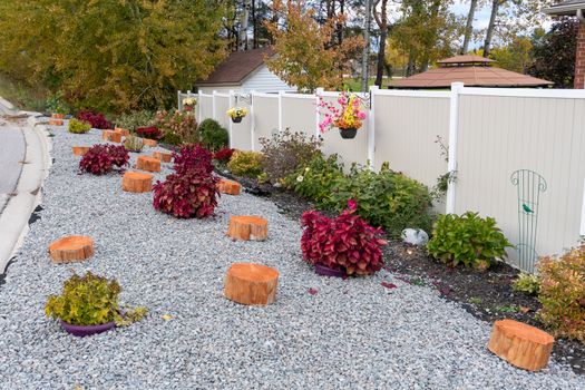 The section between the road and the fence is decoratively decorated