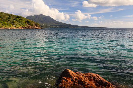 The view from Cockleshell Bay on the Caribbean island of St. Kitts in the West Indies.  The island of Nevis can be seen in the background.