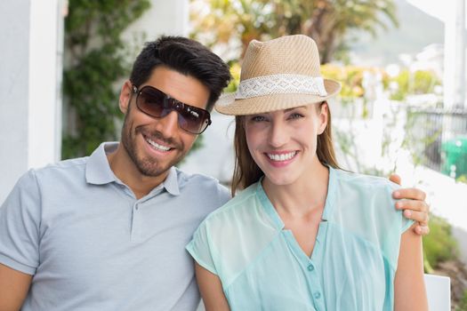 Close-up portrait of a loving couple smiling outdoors