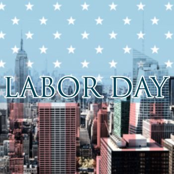Labor day text  against city skyline
