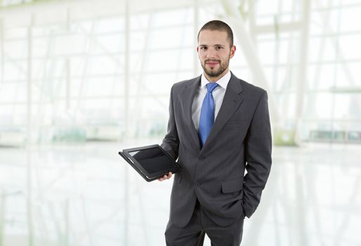 young businessman with a tablet pc, at the office