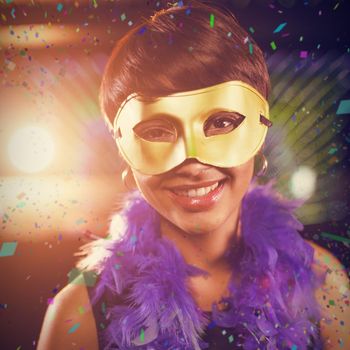 Woman wearing masquerade in bar against flying colours