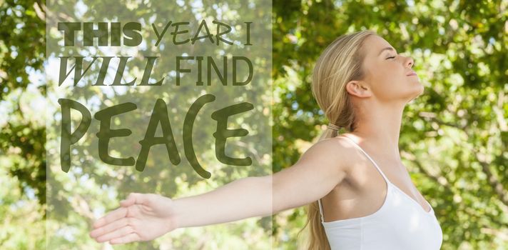 This year i will find peace against attractive blonde woman practicing yoga in a park