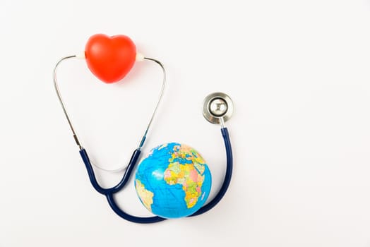 World health day concept, Stethoscope, globe and red heart on white background with copy space. Global health care