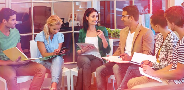 Attentive creative business people in meeting at office