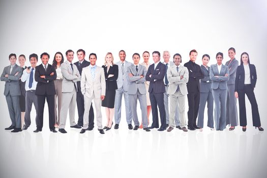 Business people standing up against a white background