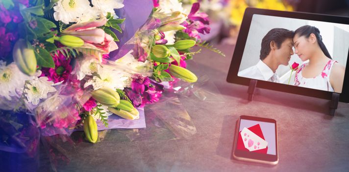 Love letter against wireless technology with flower bouquet