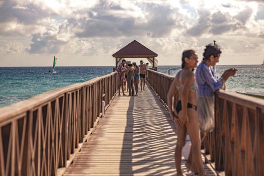 DOMINICUS, DOMINICAN REPUBLIC 6 FEBRAURY 2020: People on the pier in Dominicus