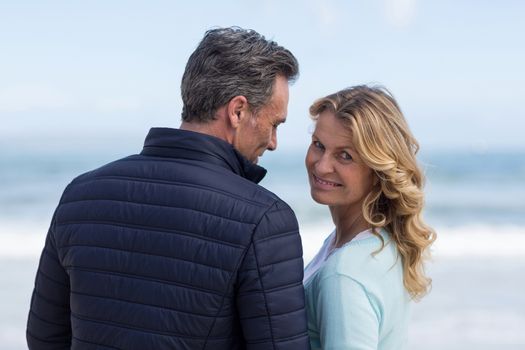 Romantic mature couple enjoying on the beach