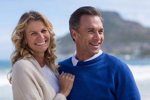 Romantic mature couple enjoying on the beach