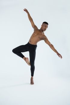 Ballerino practising ballet dance in the studio