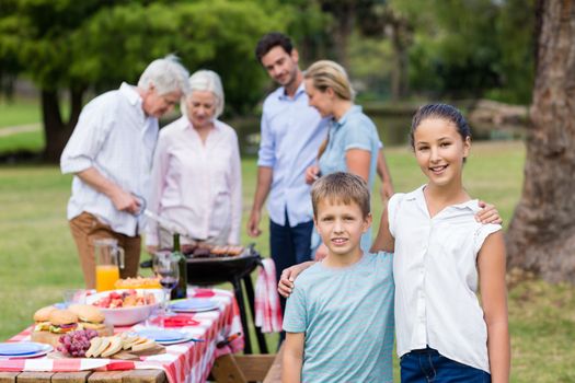 Happy family enjoying together in park