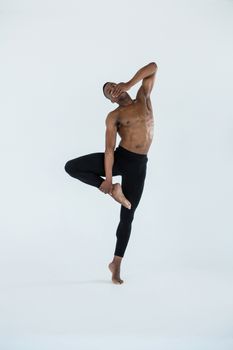 Ballerino practising ballet dance in the studio