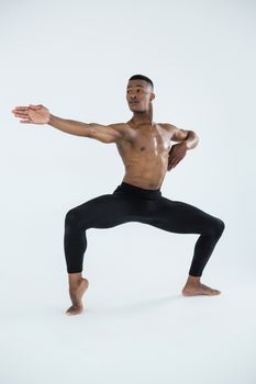 Ballerino practising ballet dance in the studio