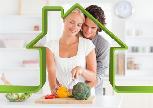 Digital composition of romantic couple in kitchen against house outline in background