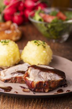 bavarian roasted pork with potato dumplings