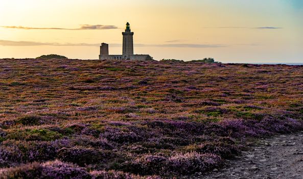 Romantic sunset in France sea coast travel attraction lighthouse