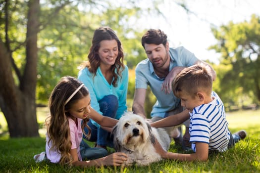 Happy family enjoying in park on sunny a day