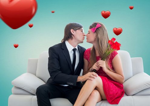 Composite image of romantic couple in love while sitting on a sofa