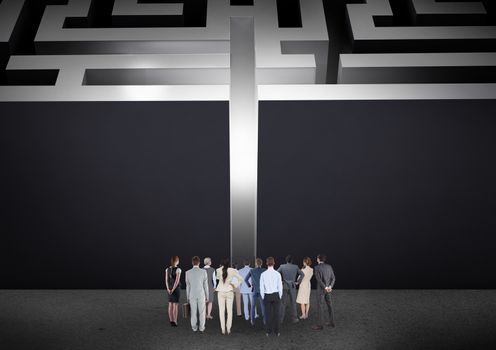Rear view of business people looking at maze