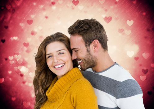 Composite image of couple embracing each other against pink background