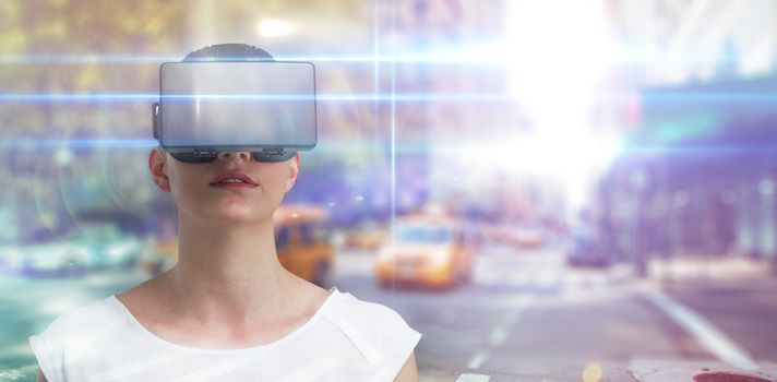 Serious woman using virtual reality simulator against blurred new york street