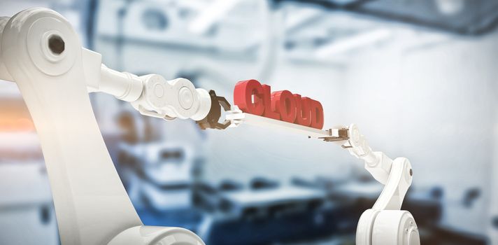 Mechanical robotic hands holding cloud text against factory