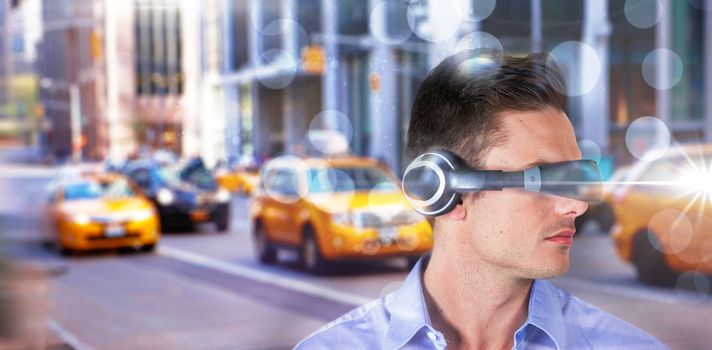 Handsome young man with virtual reality simulator against blurry new york street