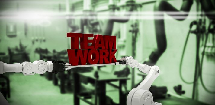 White robotic hand holding team work text against white background against various eqipments and pipes in factory