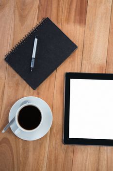 Coffee with organizer and digital tablet on table