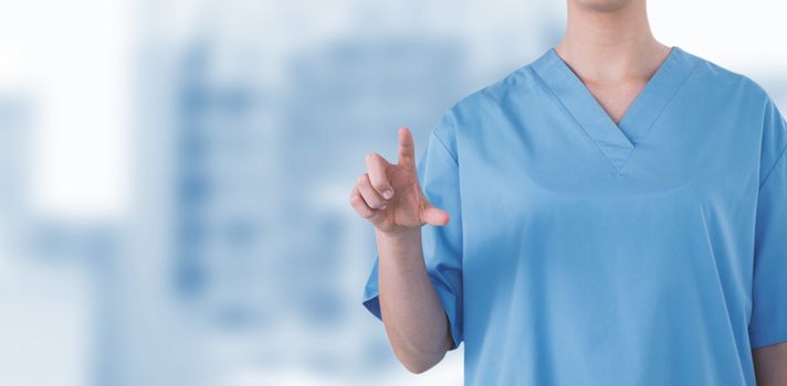 Midsection of female doctor using digital screen against dental equipment