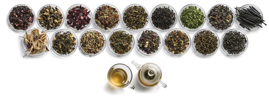 Large assortment of tea on a white background. The view from the top.