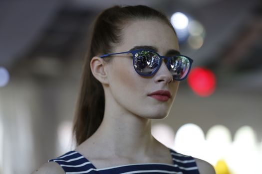 Woman model in sunglasses