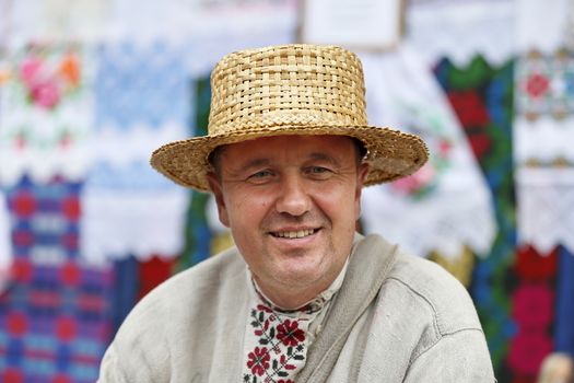 Slavic man in a straw hat