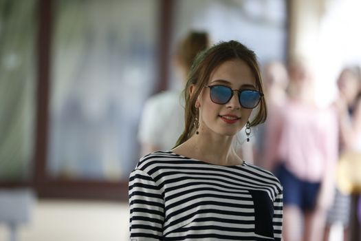 Woman model in sunglasses