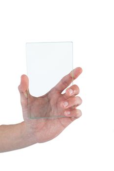 Hand holding futuristic mobile phone against white background