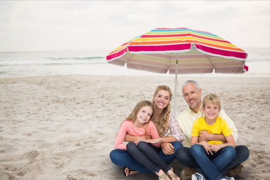 Digital composite of family at beach