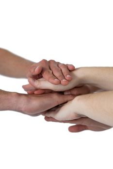People forming hands stack against white background