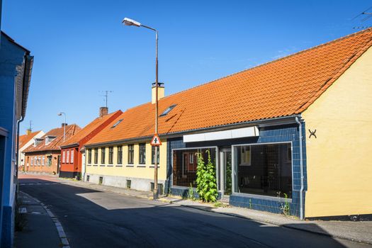 Closed store in a small danish city with colorful buildings on the island of Bornholm