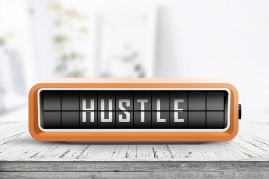 Hustle alarm on a wooden table in a bright room with a retro device