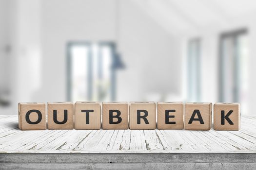 Outbreak message on a desk in a bright lab in daylight 