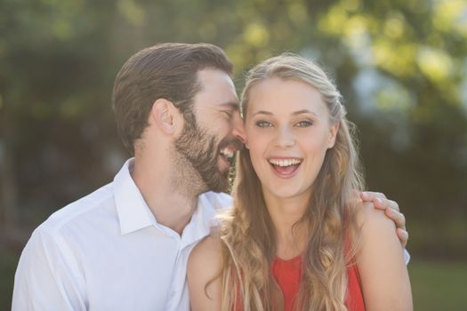 Romantic couple enjoying in park on a sunny day