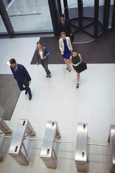 Top view of business executives walking in the office