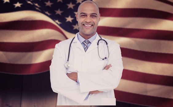 Portrait of smiling male doctor against composite image of digitally generated united states national flag