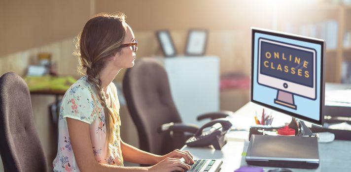 Print against woman working on computer