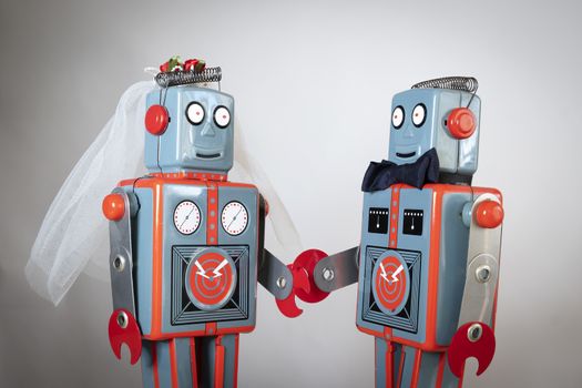 Two heterosexual robots getting married themes of humour love concept