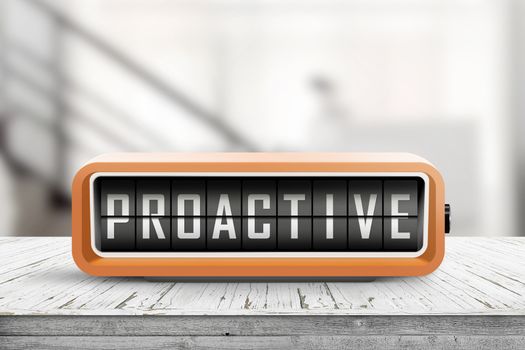 Proactive sign in the shape of a retro device on a wooden desk in a room