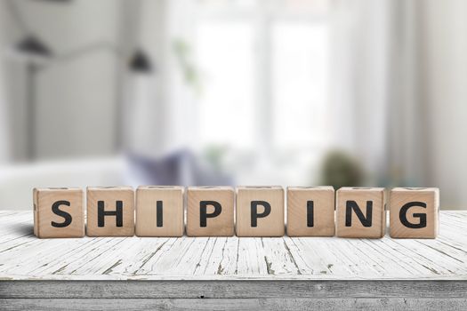 Shipping sign on a wooden desk in a bright living room with daylight